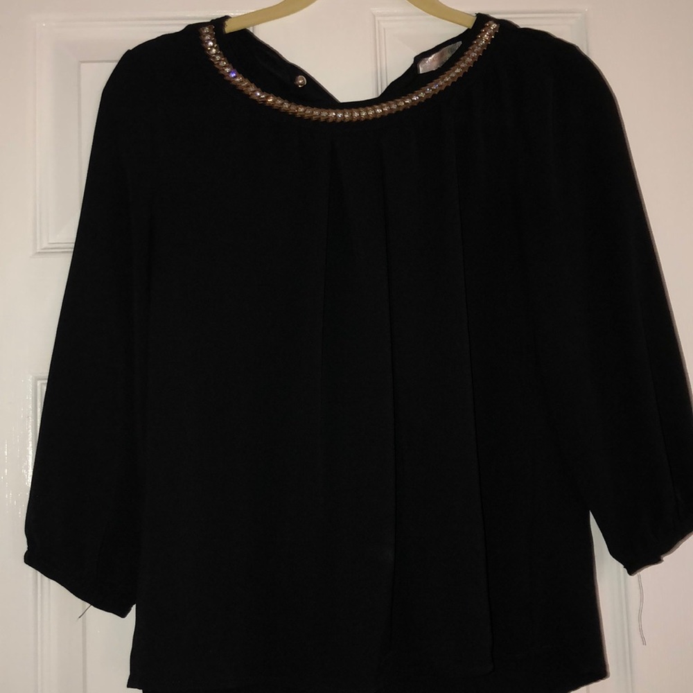 Black blouse with jeweled neckline